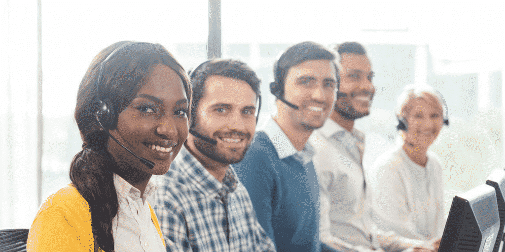 live receptionist at ambs call center smiling on the phone